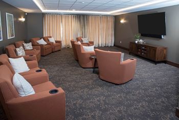Media room with theater with recliner chairs